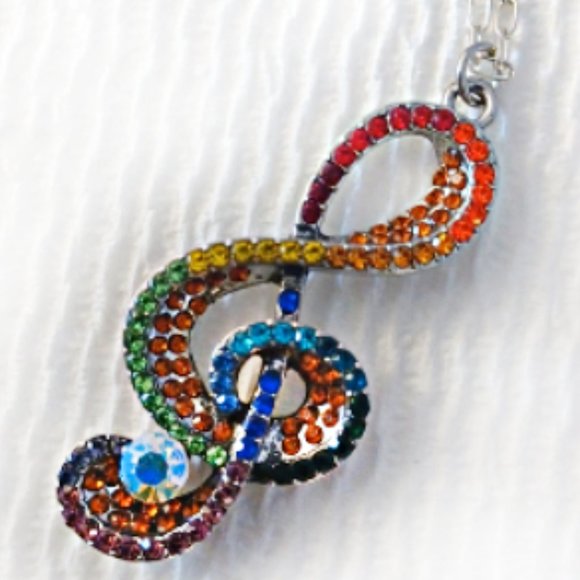 NWOT Gorgeous Rainbow Rhinestone Silvertone G Clef necklace - Picture 2 of 8